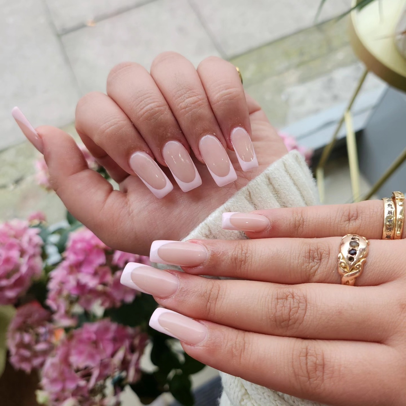 Classic white-tip French manicure, glossy finish