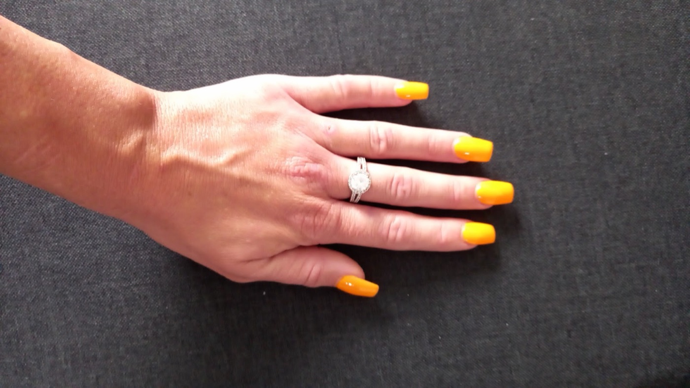 Almond nails in a mixed pastel and metallic manicure